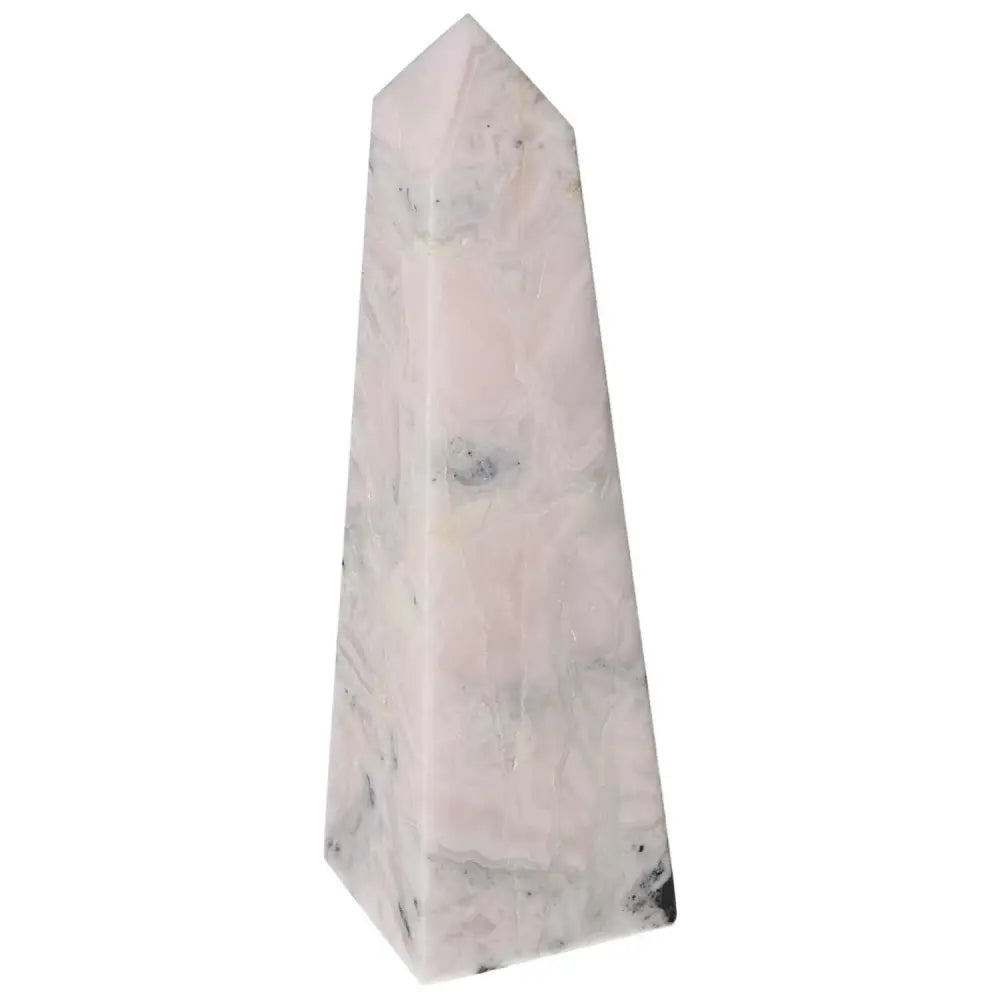 Manganocalcite tower crystal for healing, creativity, and negative energy clearing.