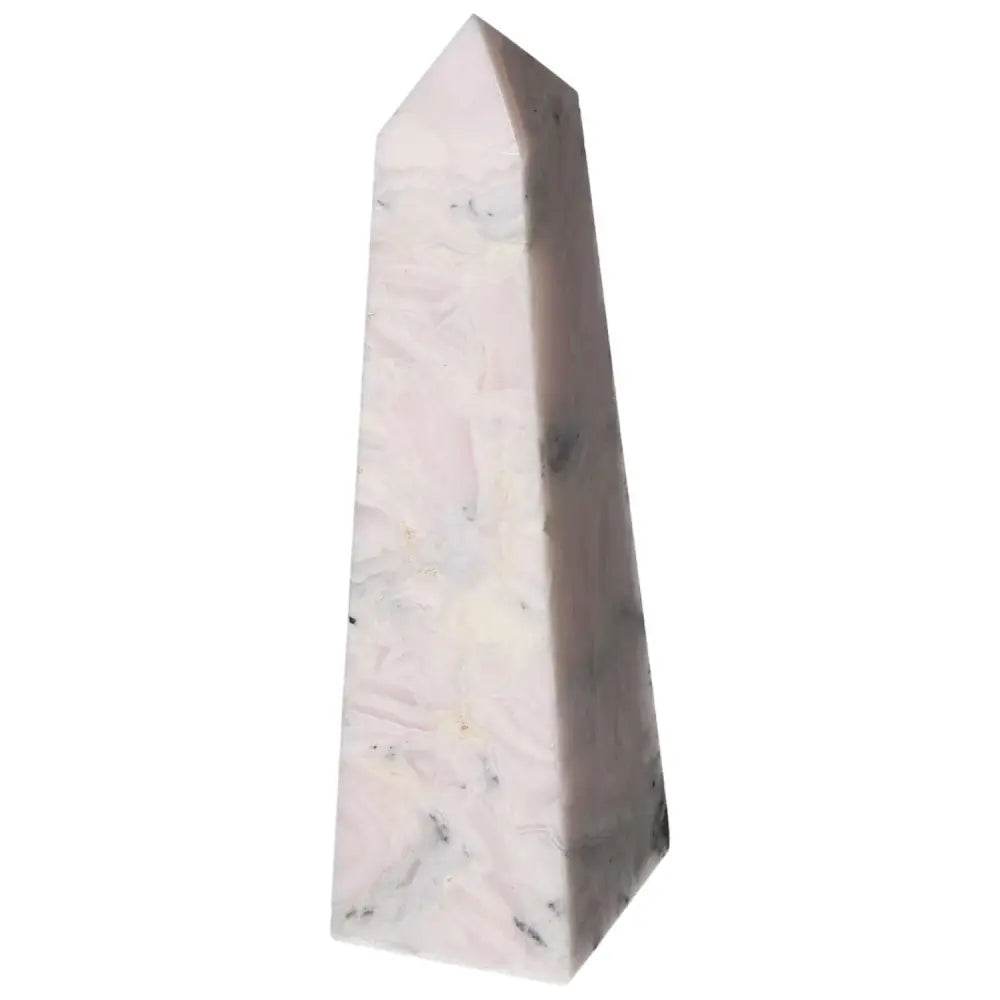 Elegant manganocalcite tower crystal for healing, creativity boost, and negative energy clearing; promotes peace and productivity.