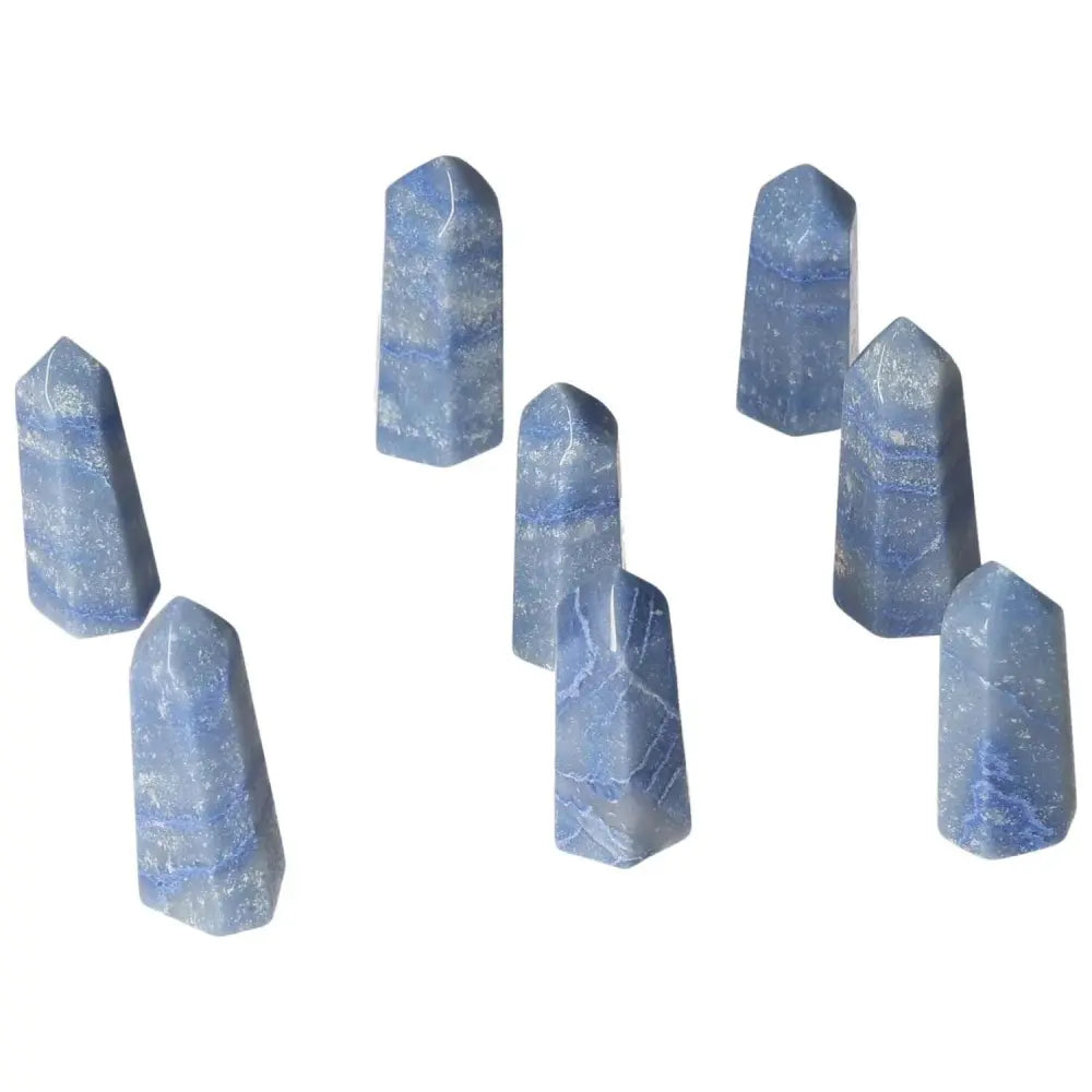 Mini Blue Quartz Points promoting calm, communication, and clarity with soft hues, ideal for chakra healing and emotional balance.