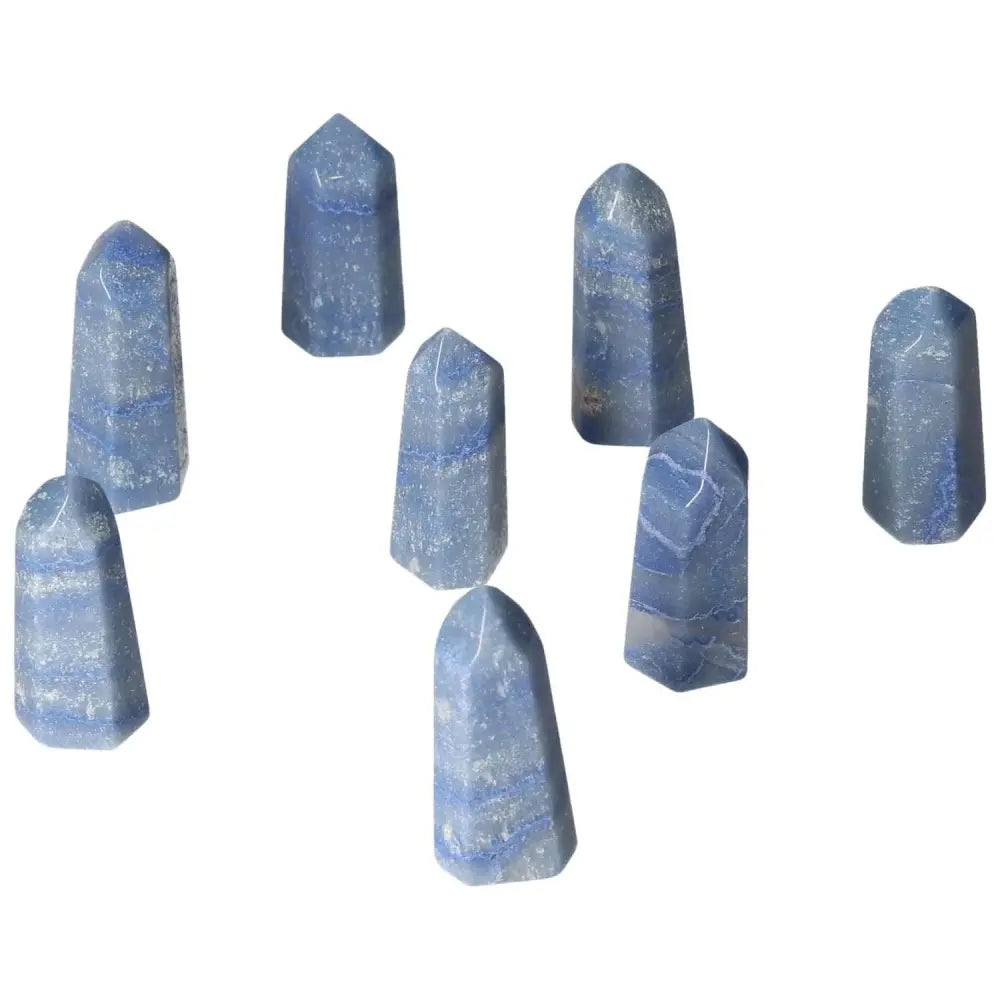 Mini Blue Quartz points for calm, communication, clarity; supports throat, third eye chakras, promotes peace and focus.