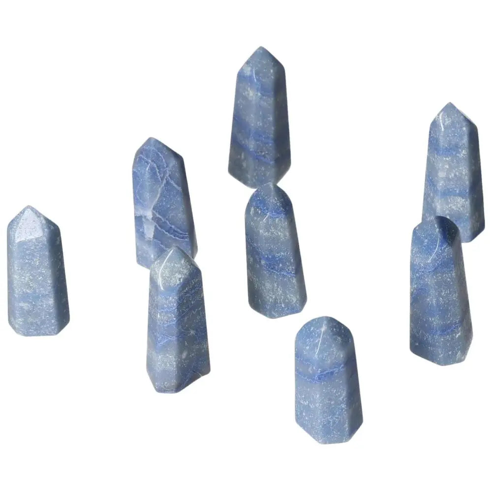 Mini Blue Quartz Points promoting calm, clarity, and communication; ideal for supporting throat and third eye chakras.
