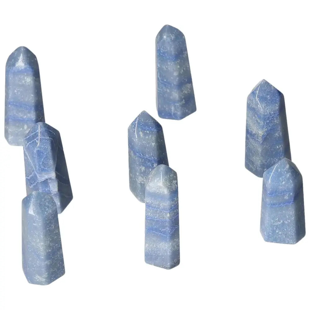 Mini Blue Quartz Points for calm communication and clarity, featuring a soothing blue hue that supports throat and third eye chakras.