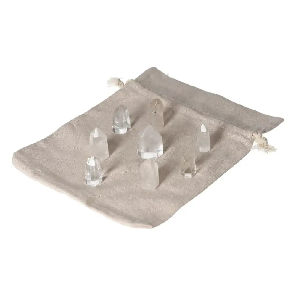 Mini Clear Quartz Points on fabric pouch; energy amplifying crystals for clarity, focus, and healing.