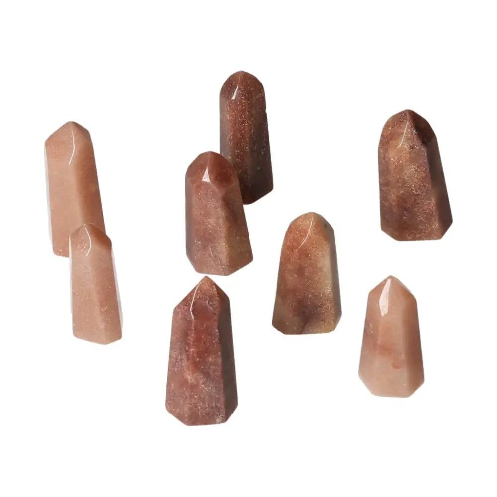 Mini Red Quartz Points with natural hematite inclusions, enhancing vitality, courage, and rooted energy for confidence and resilience.