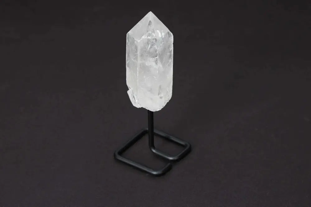Natural Clear Quartz Point on modern stand, ideal for meditation, energy work, and amplifying clarity in any space; Master Healer crystal.
