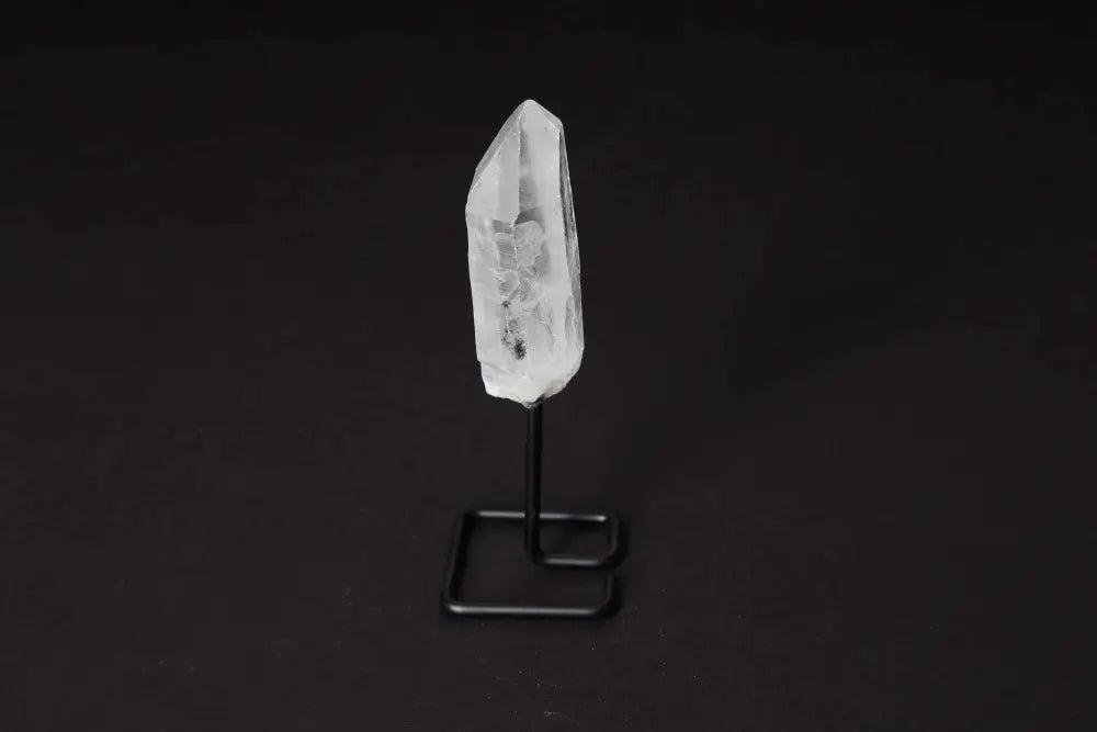 Natural Clear Quartz Point on Stand for energy amplification and clarity, ideal for meditation and manifestation practices.