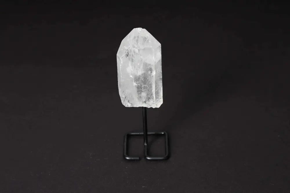 Clear Quartz Point on Stand for energy amplification and alignment.