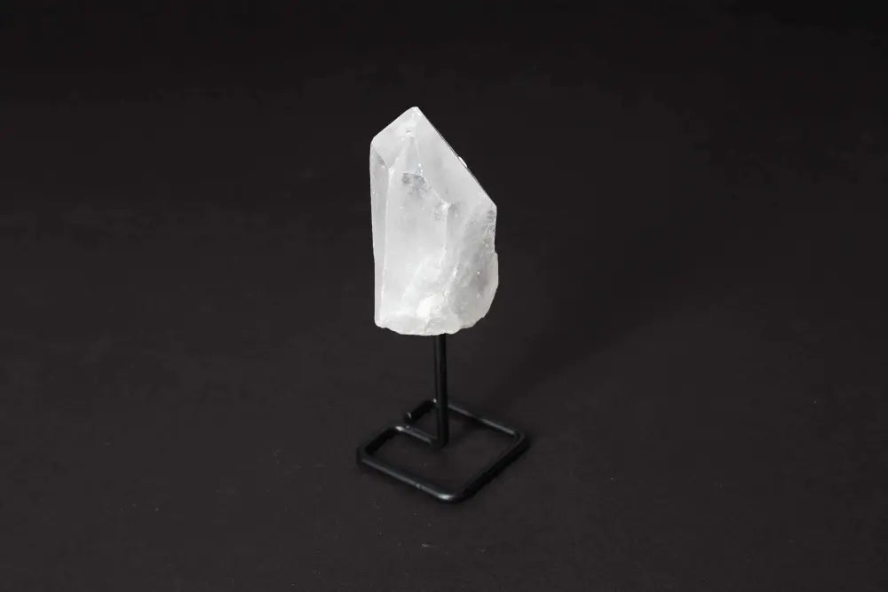 Natural Clear Quartz Point with modern stand for energy amplification and clarity, ideal for meditation and manifestation.