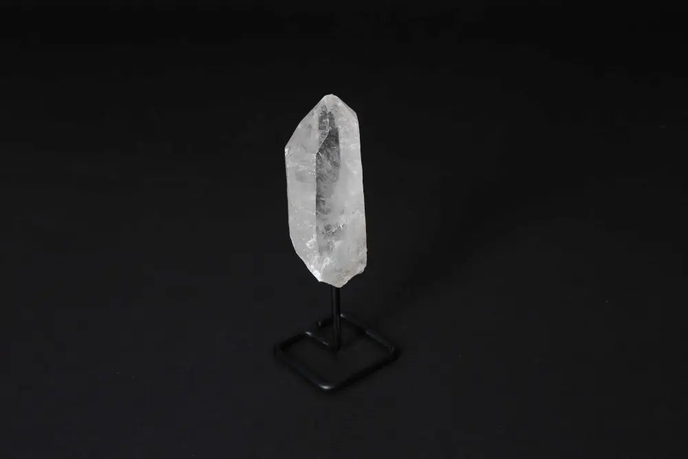 Natural Clear Quartz Point on Modern Stand for Amplification and Clarity