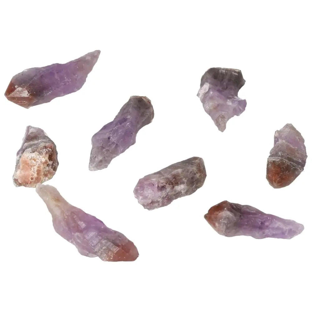 Collection of Natural Point Amethyst S crystals from Sylvia Crystals, designed to enhance tranquility and spiritual harmony.