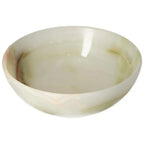 15 cm onyx bowl with polished surface and delicate veining, showcasing light reflection and natural variations in color for home décor.