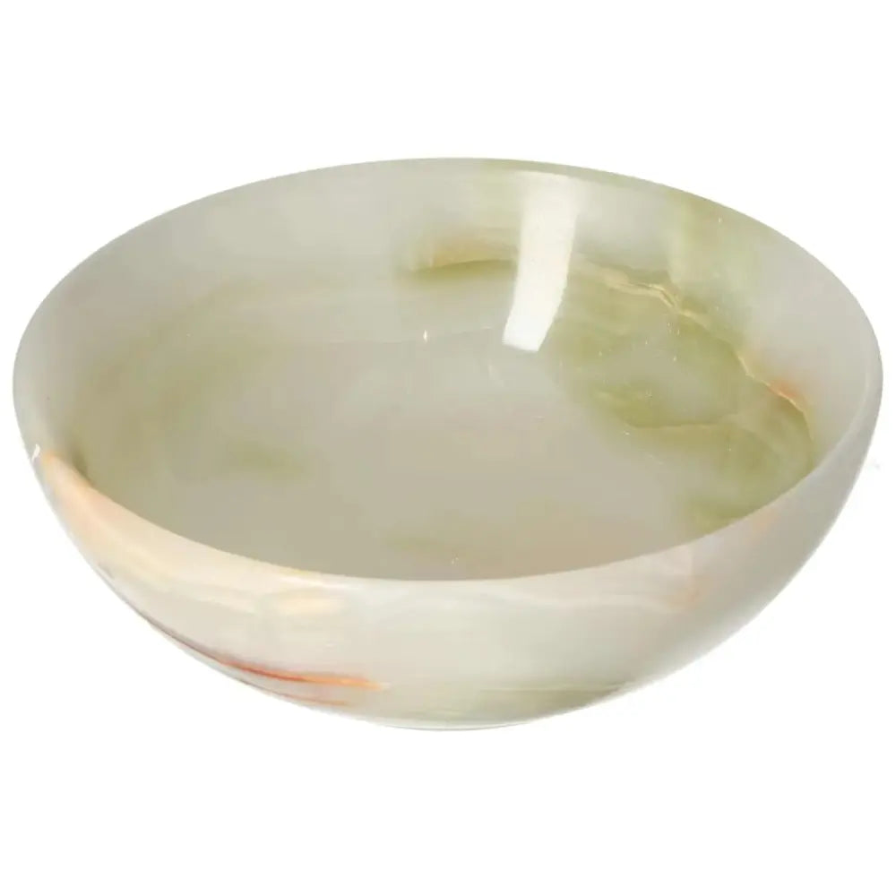 Elegant 15 cm onyx bowl with polished surface and delicate veining, perfect for sophisticated home décor enhancement.