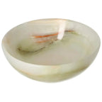 15 cm onyx bowl with smooth polished surface, showcasing delicate veining and organic color variations, adding elegance to interior decor.