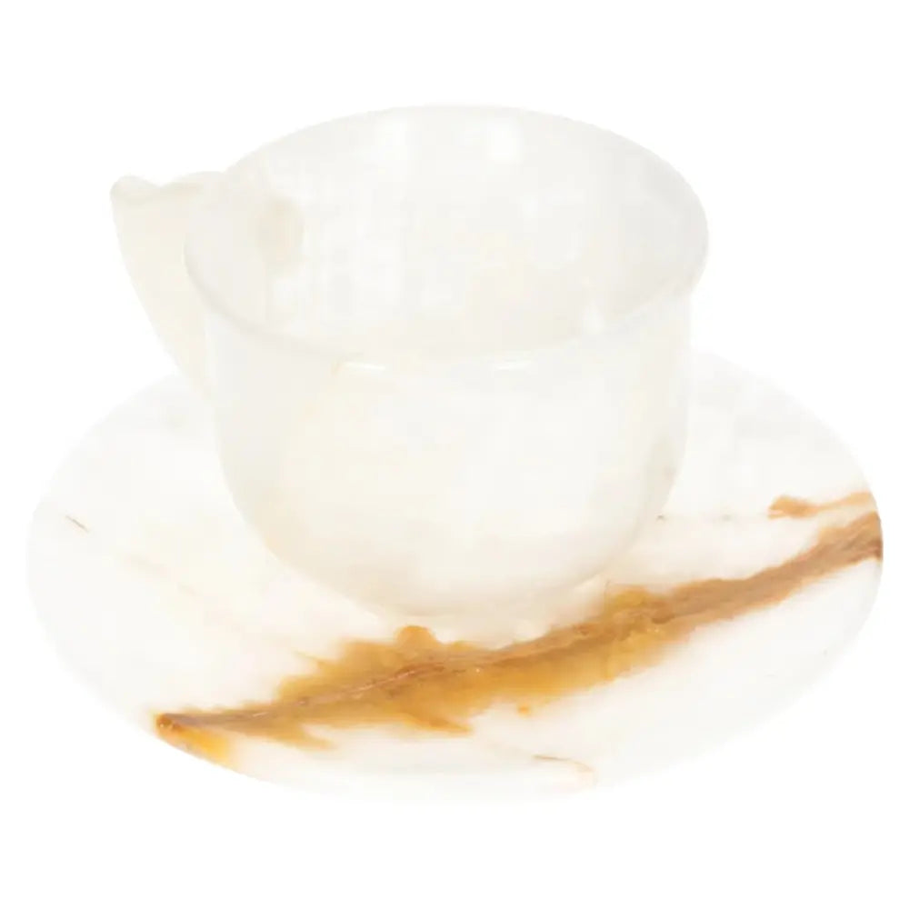 Exquisite off-white onyx coffee cup and plate set with unique patterns, showcasing elegance and luxury for a refined coffee ritual.