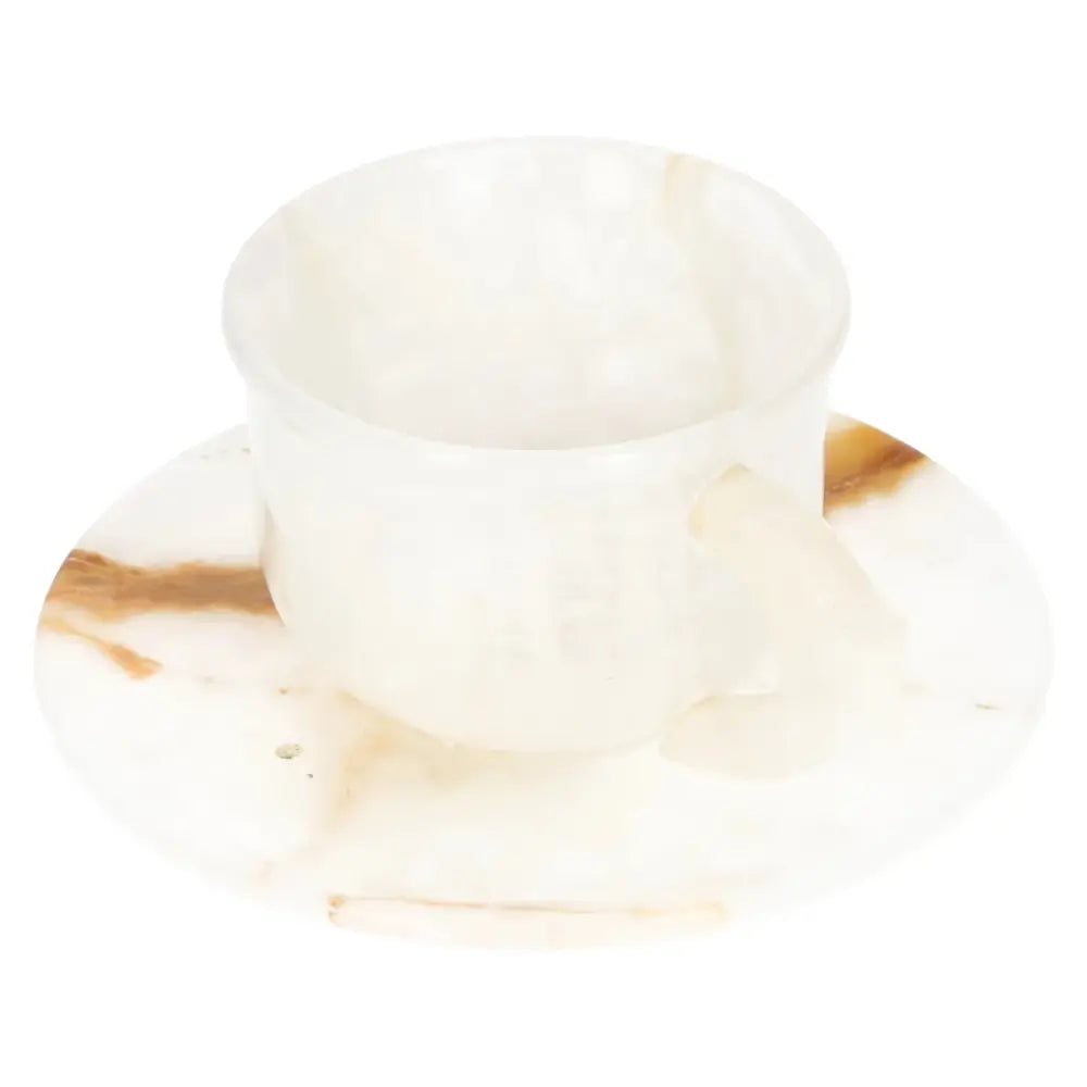 Exquisite off-white onyx coffee cup and plate set, showcasing unique natural patterns, perfect for enhancing your coffee ritual.