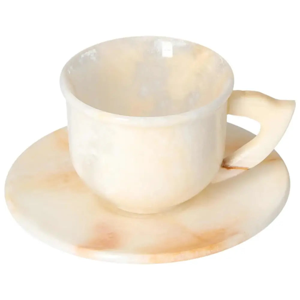 Exquisite off-white onyx coffee cup with matching plate, showcasing unique natural variations and a polished, elegant finish.