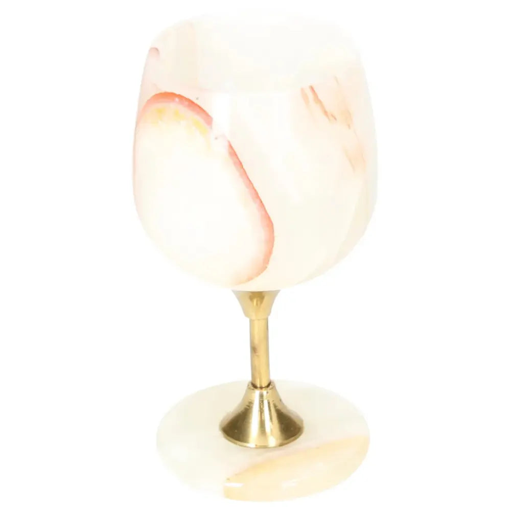 Exquisite onyx wine glass with unique veining and polished surface, perfect for elegant fine dining and sophisticated occasions.