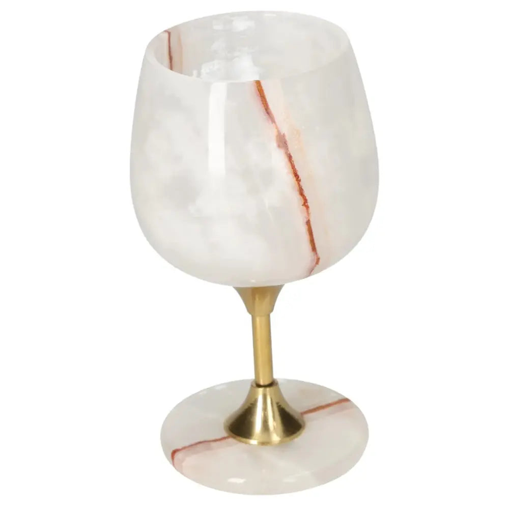 Elegant onyx wine glass with unique veining and polished finish, featuring a gold stem, perfect for sophisticated occasions.