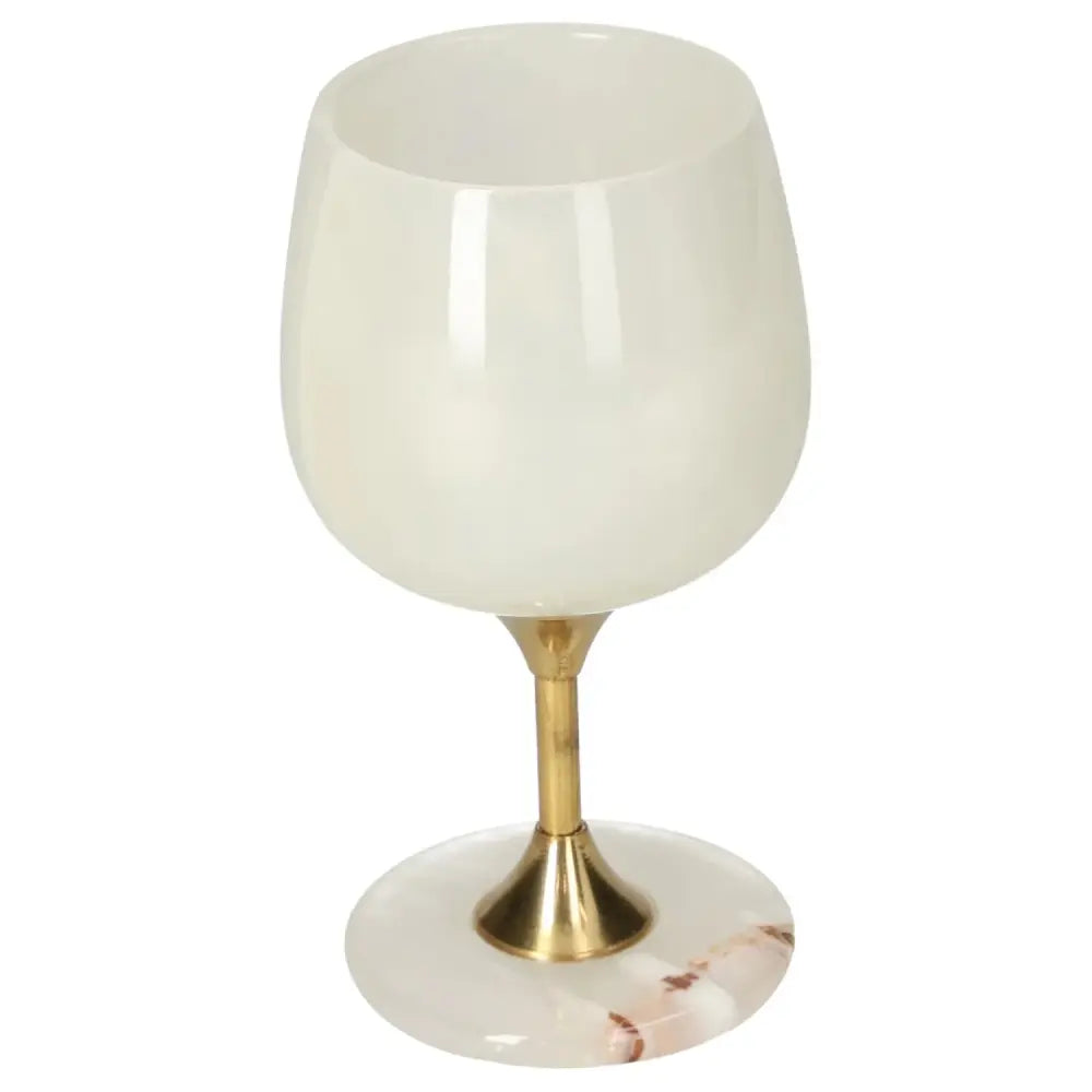 Exquisite off-white onyx wine glass with elegant gold stem, showcasing unique veining, perfect for adding sophistication to any occasion.