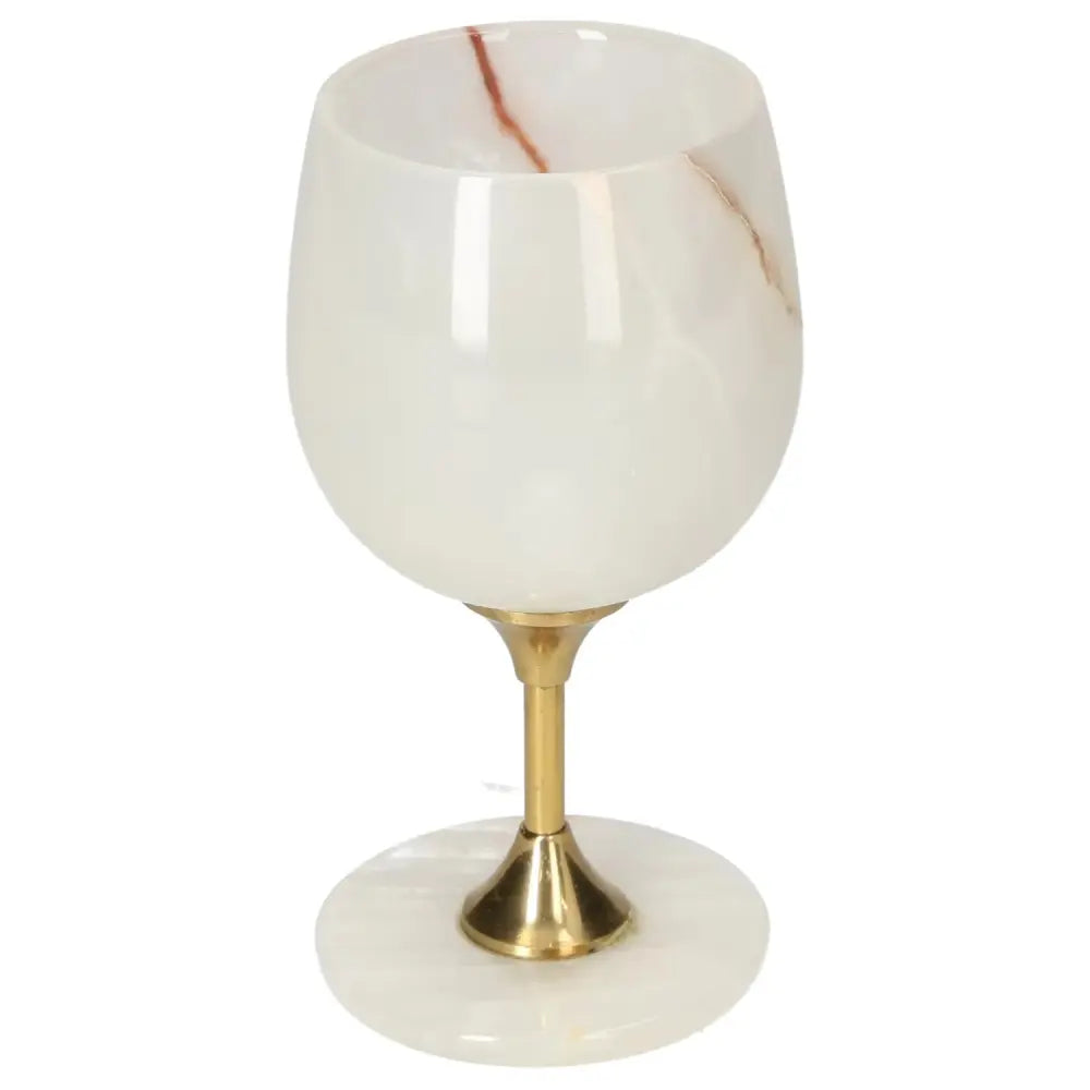 Exquisite off-white onyx wine glass with unique veining and polished surface, featuring a gold-toned stem, perfect for elegant occasions.