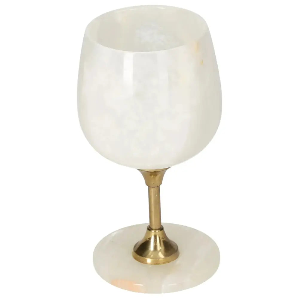 Elegant off-white onyx wine glass with natural veining, featuring a polished surface and gold-toned stem, perfect for sophisticated dining.