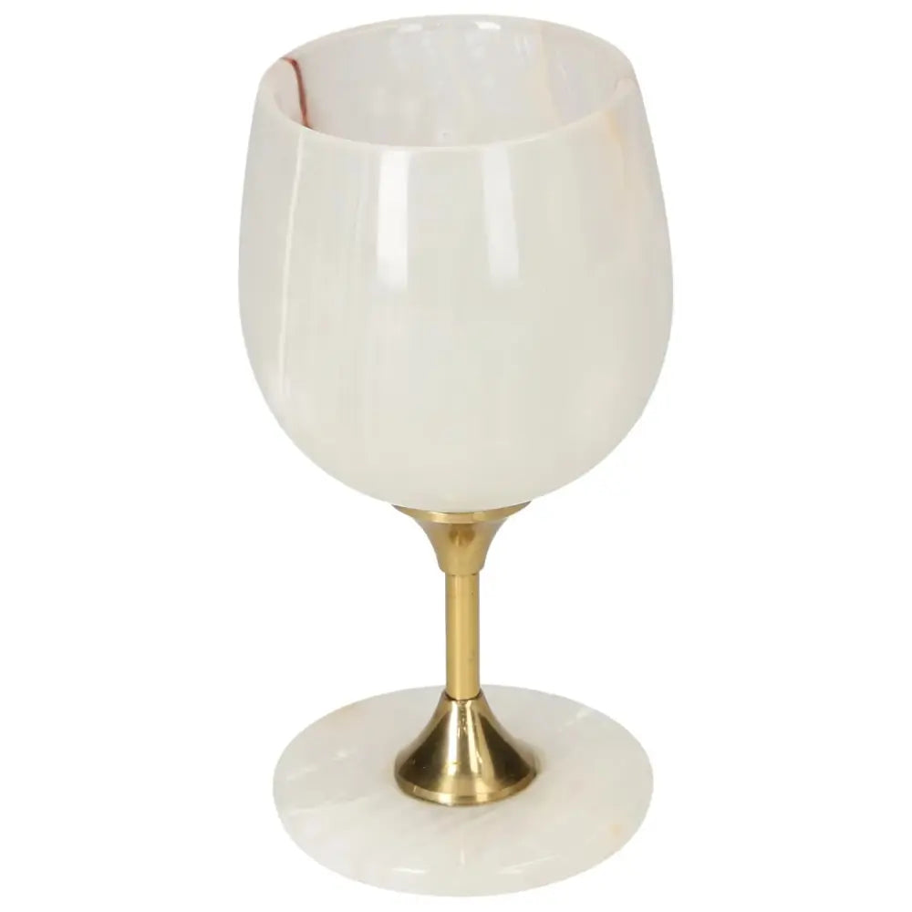 Elegant onyx wine glass with unique veining, polished off-white finish, and a golden stem, perfect for luxurious dining settings.