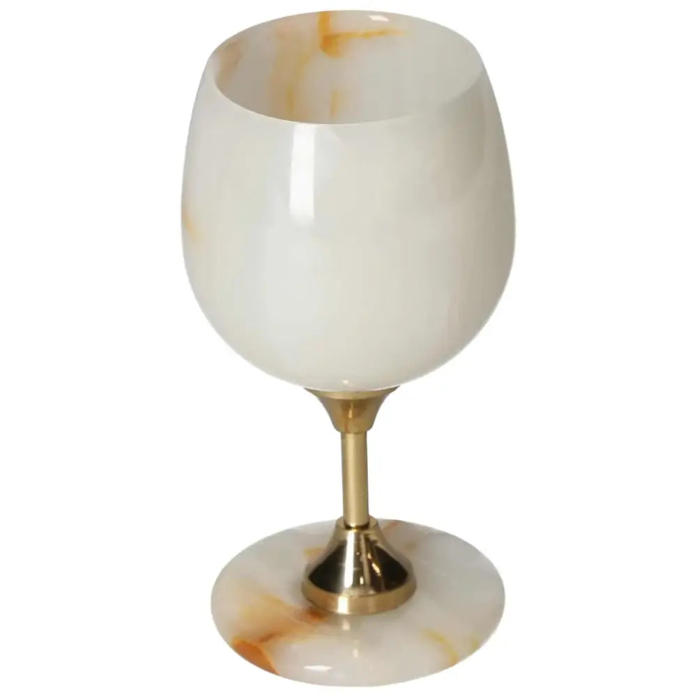 Elegant onyx wine glass with unique off-white veining and polished finish, enhancing sophisticated occasions with natural beauty.