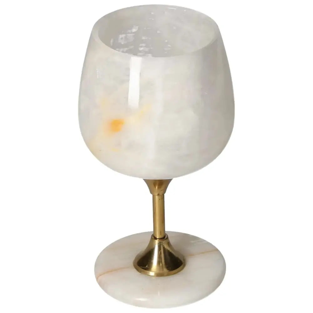 Exquisite off-white onyx wine glass with unique veining, polished surface, and elegant design, perfect for sophisticated drinkers.