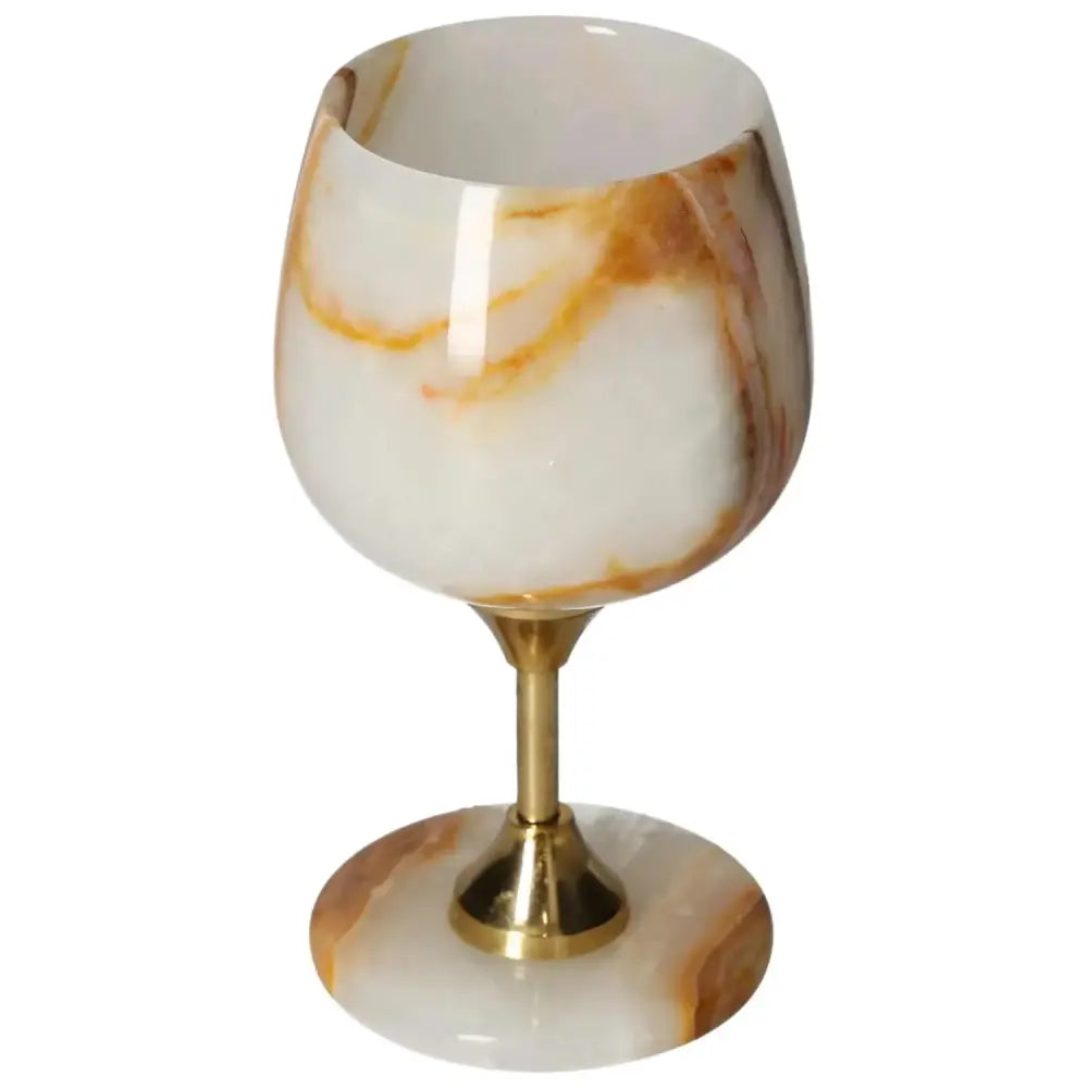 Exquisite onyx wine glass with unique color variations and polished surface, perfect for sophisticated occasions.