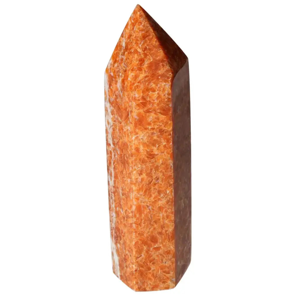Orchid Calcite Obelisk with vibrant orange hues and polished surface, symbolizing grounding energy and spiritual growth.