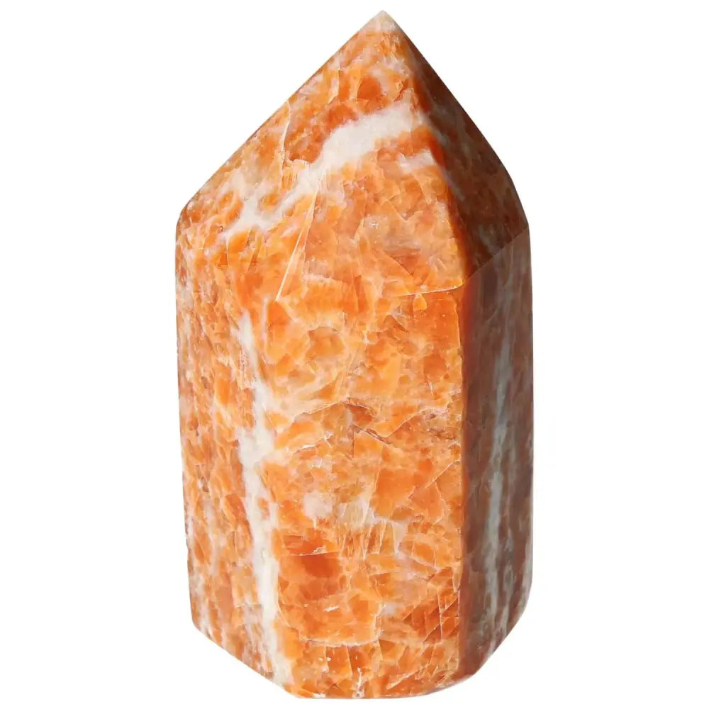 Orchid Calcite Obelisk with orange, peach, and white patterns from Sylvia Crystals. A spiritual centerpiece for elegance and energy.