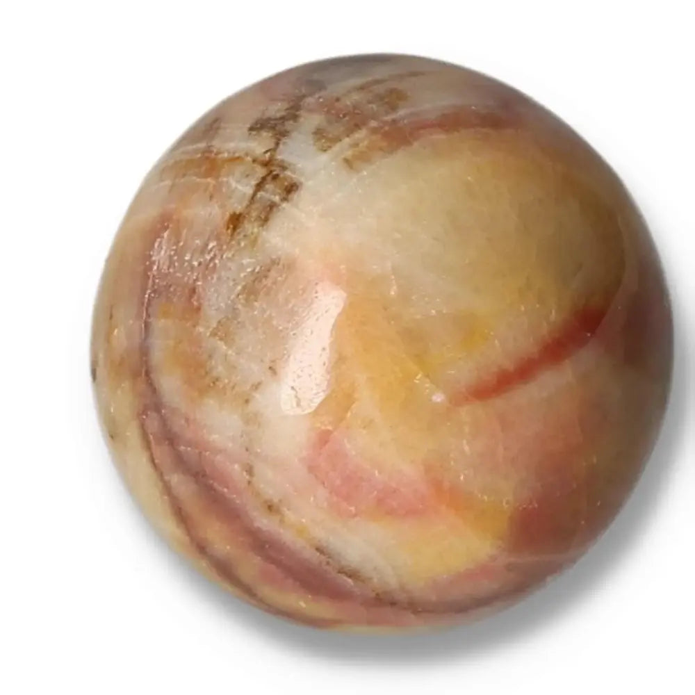 Peach Calcite Sphere promoting emotional healing and inner peace, polished gemstone ball for harmony and creativity.