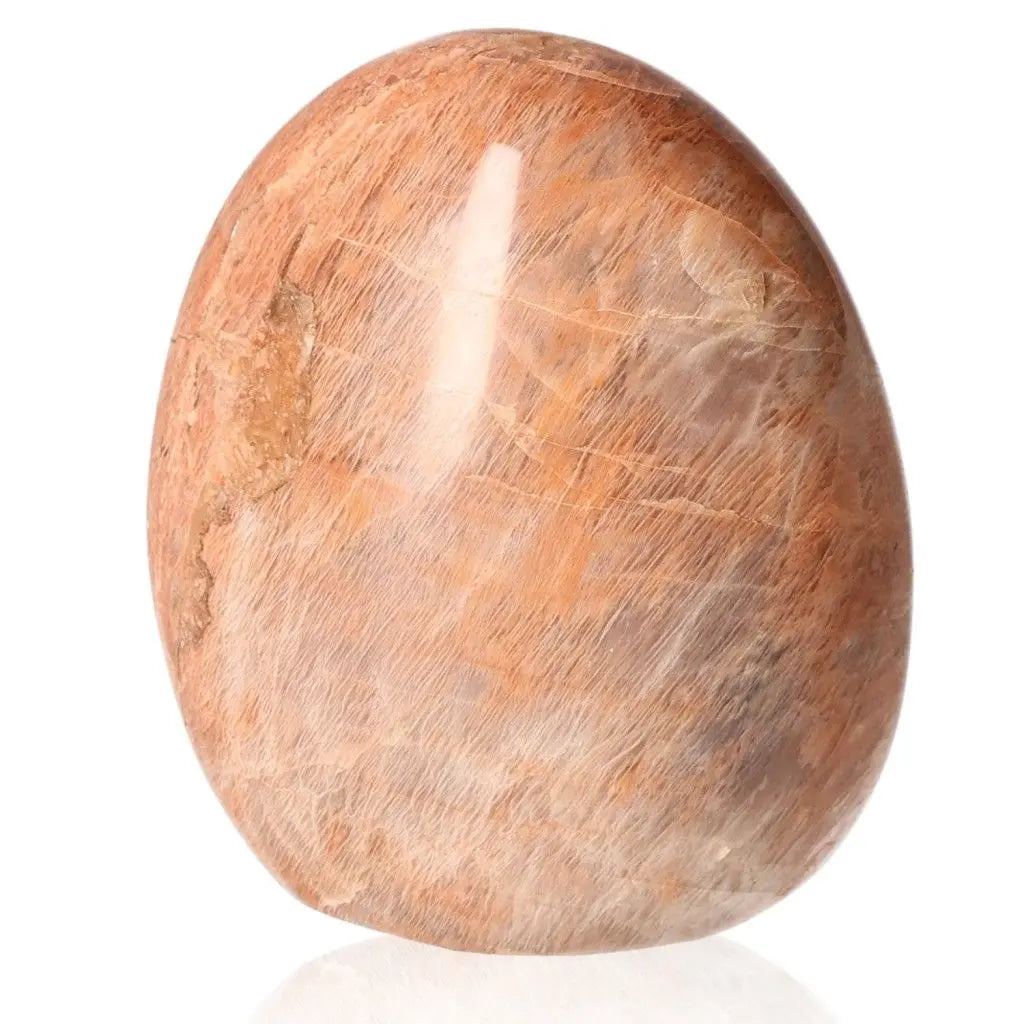 Peach Moonstone gemstone with soft peach hue symbolizing emotional healing and feminine energy.