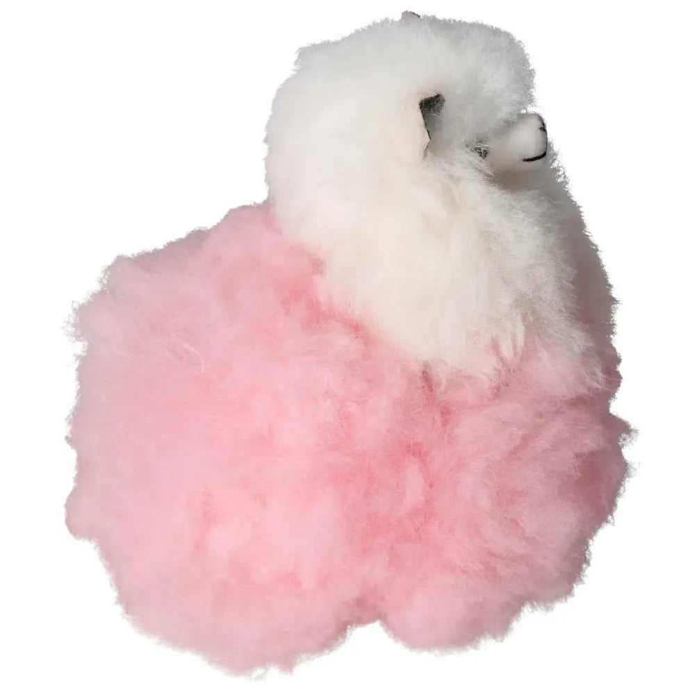 Pink alpaca plush toy made from 100% natural alpaca hair, handcrafted in Peru by local artisans. Ethically sourced from Andean highlands.