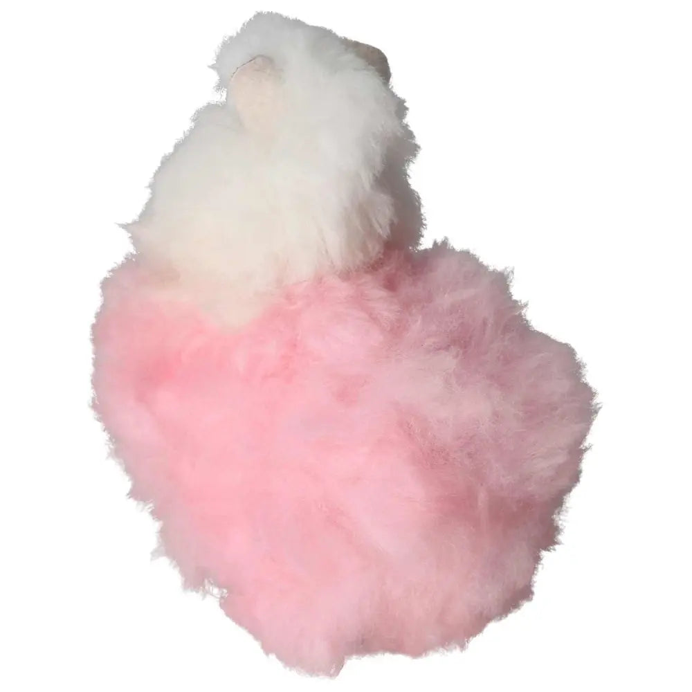 Soft pink alpaca plush toy made from authentic Peruvian alpaca hair, offering unmatched softness and crafted by skilled artisans.