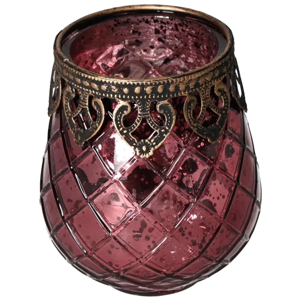 Pink lantern with metal rim by Sylvia Crystals, offering luxury and conscious living with warm hue and modern elegance.