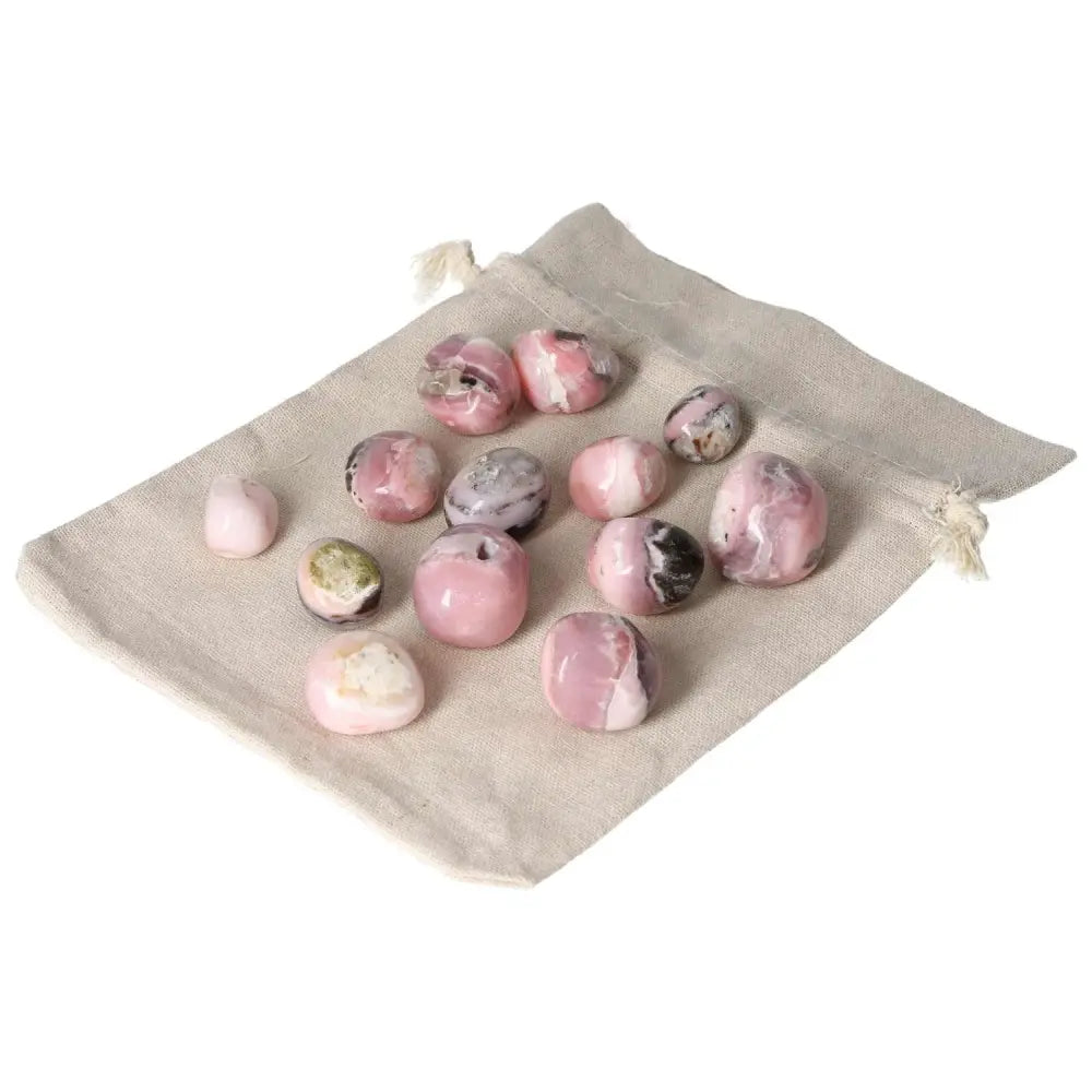 Pink Opal Tumbled Stones on Beige Bag, Soothing Pink Gemstones for Emotional Healing and Renewal
