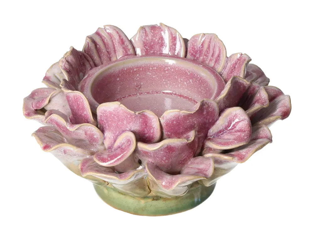 Pink stoneware flower motif candle holder 16x16x19, elegant decorative piece from Sylvia Crystals blending beauty and mindfulness.