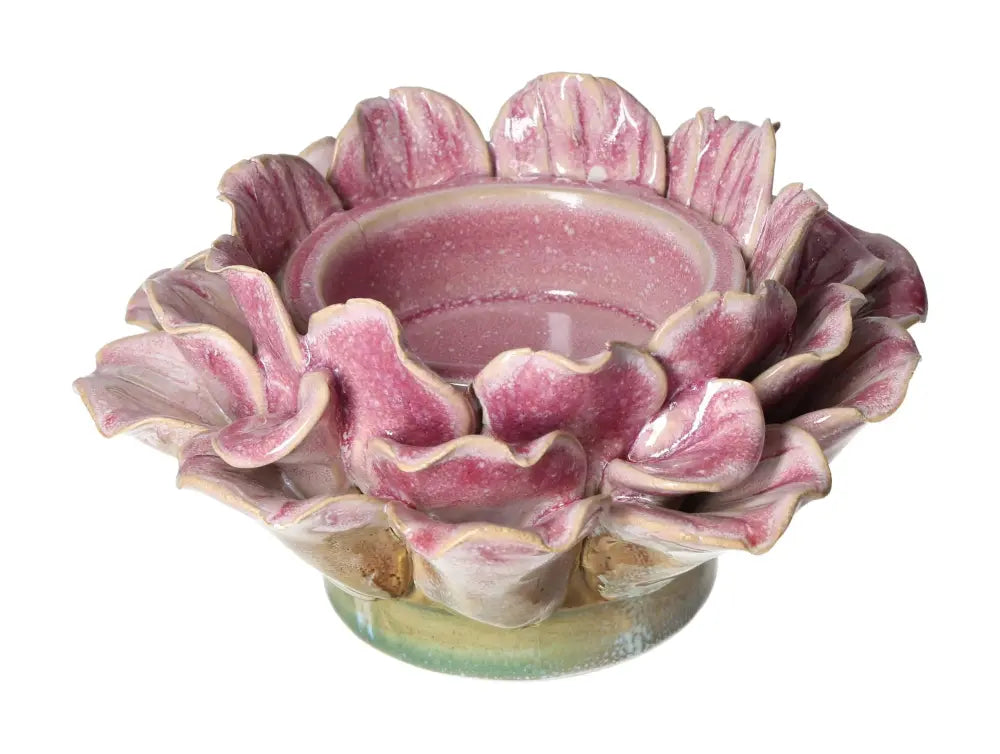 Pink stoneware candle holder with flower motif by Sylvia Crystals, blending luxury and mindfulness, size 16x16x19.