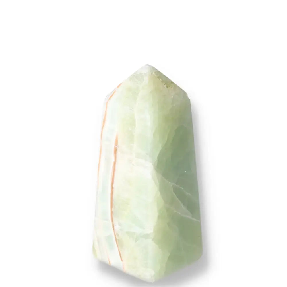 Pistachio Calcite Tower with pale green hues for balance and soothing energy