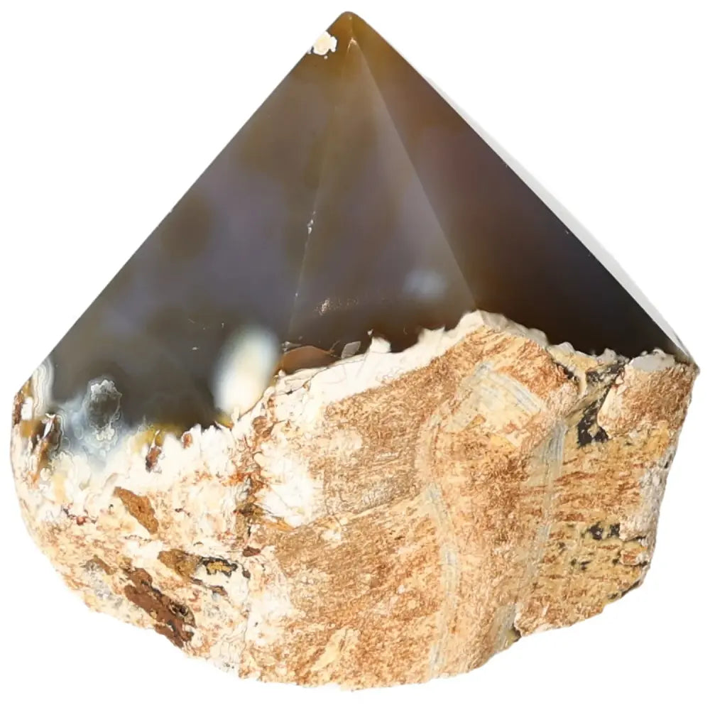 Elegant polished agate point from Sylvia Crystals with rich patterns and hues, ideal for energy balance and luxury conscious living.