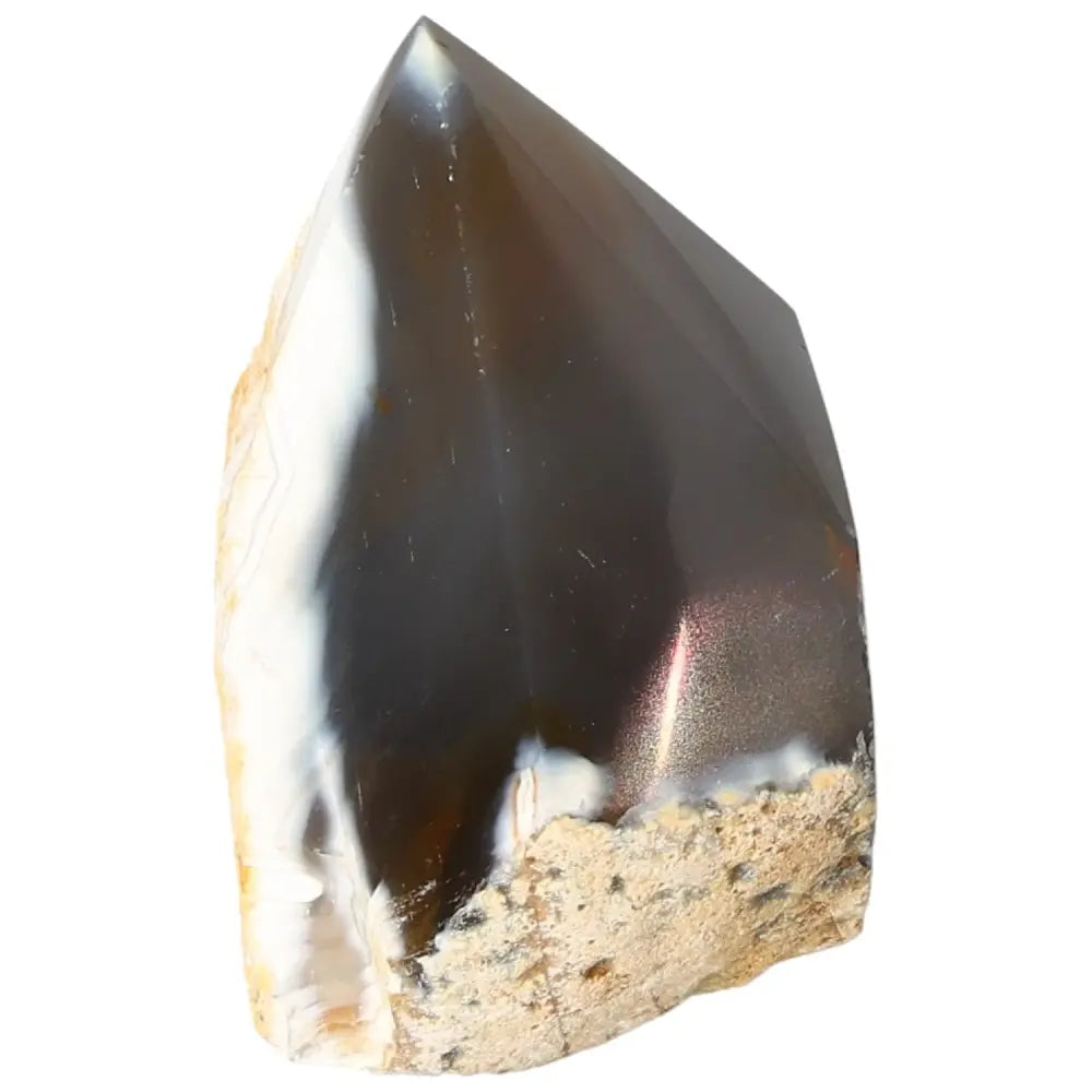 Polished Agate Point from Sylvia Crystals, showcasing calming energy and unique natural patterns for personal harmony and balance.