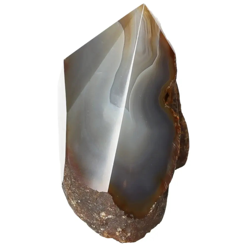 Polished Agate Point by Sylvia Crystals, showcasing natural beauty and serene energy for balance and tranquility.