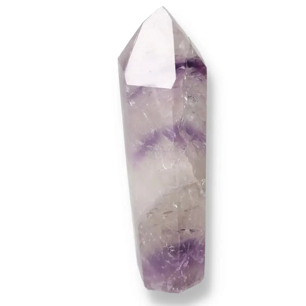 Polished Amethyst Obelisk from Sylvia Crystals, offering tranquility and stress relief, in a premium decorative piece.