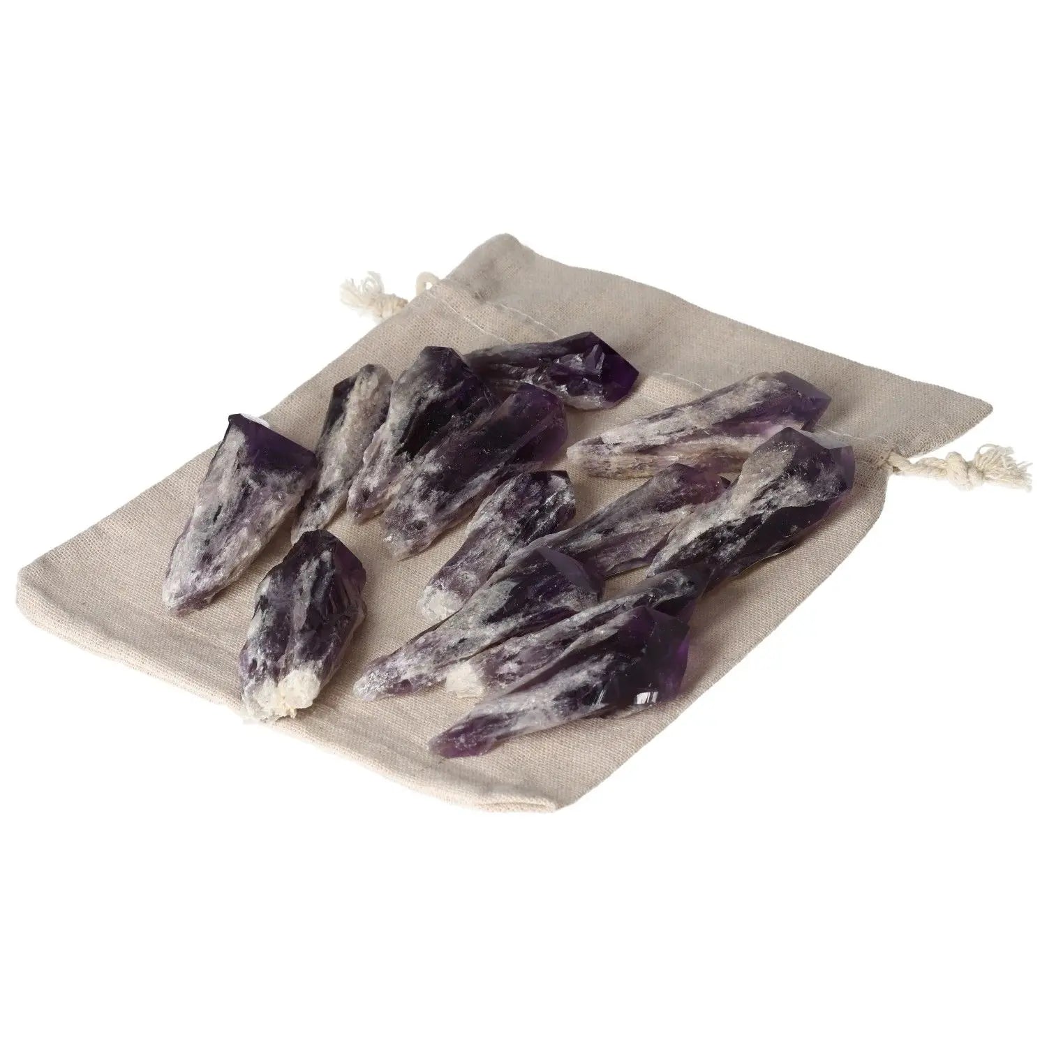 Collection of Amethyst Tips on a beige drawstring bag, ideal for stress relief and spiritual enhancement, by Sylvia Crystals.