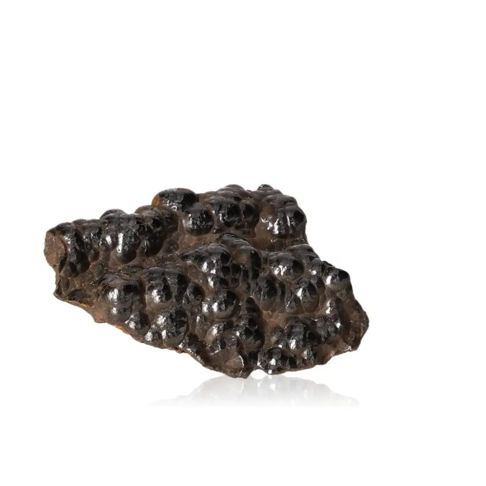 Shimmering polished botryoidal hematite crystal cluster on white background, ideal for grounding and emotional balance.