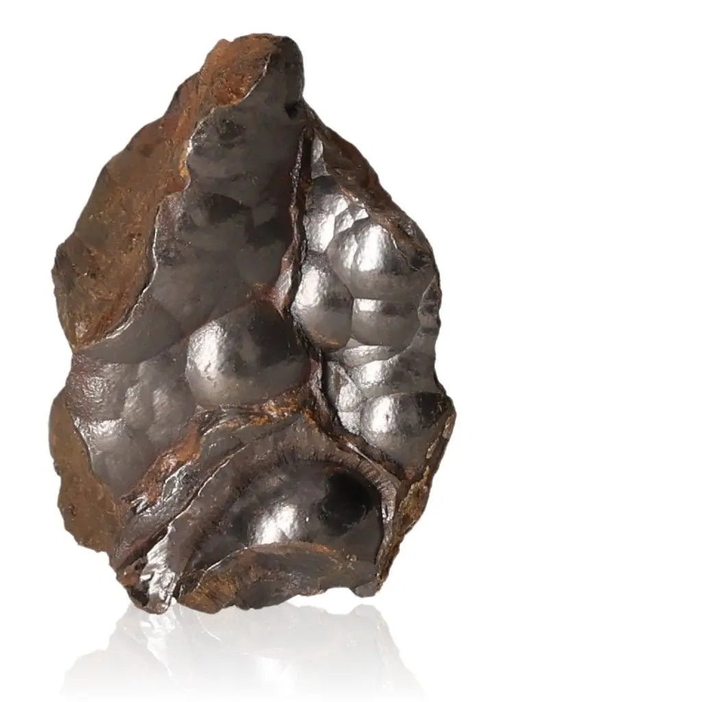 Polished botryoidal hematite crystal cluster for grounding and energy fortification, with metallic sheen for emotional balance and resilience.