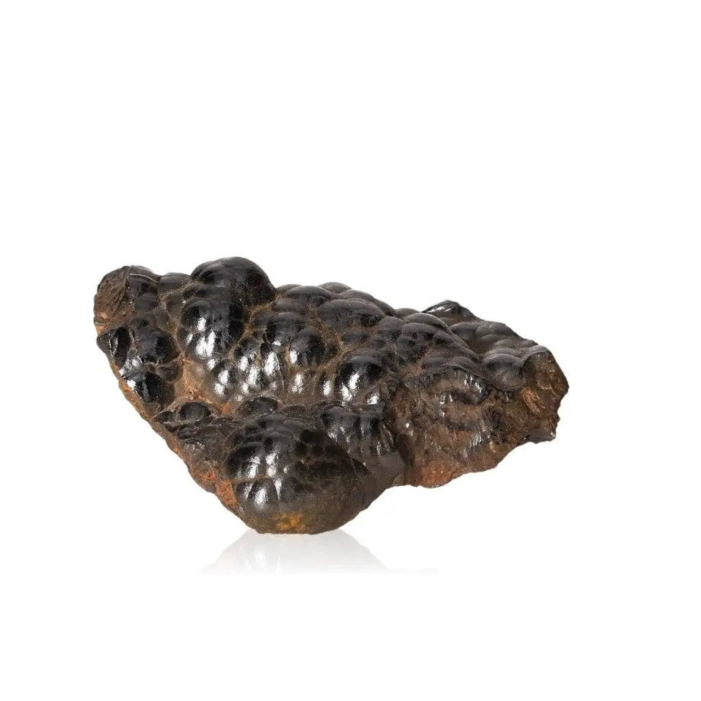 Polished Botryoidal Hematite gemstone with a shimmering metallic finish, known for its strength and stability-enhancing properties.