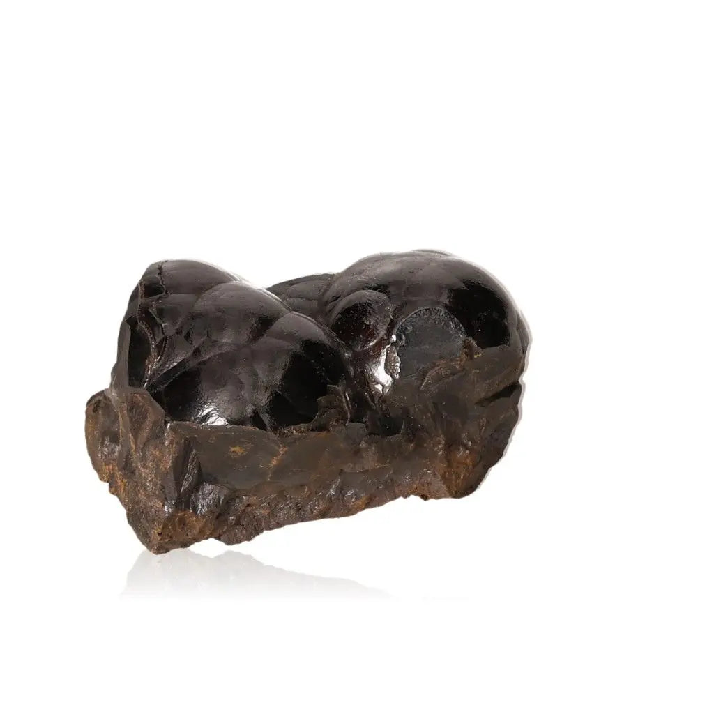 Polished Botryoidal Hematite crystal with metallic sheen, known for grounding energy and serving as a shield against negativity.