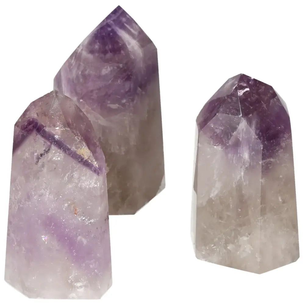 Polished Point Amethyst L crystals from Sylvia Crystals showcasing refined craftsmanship and serene energy.